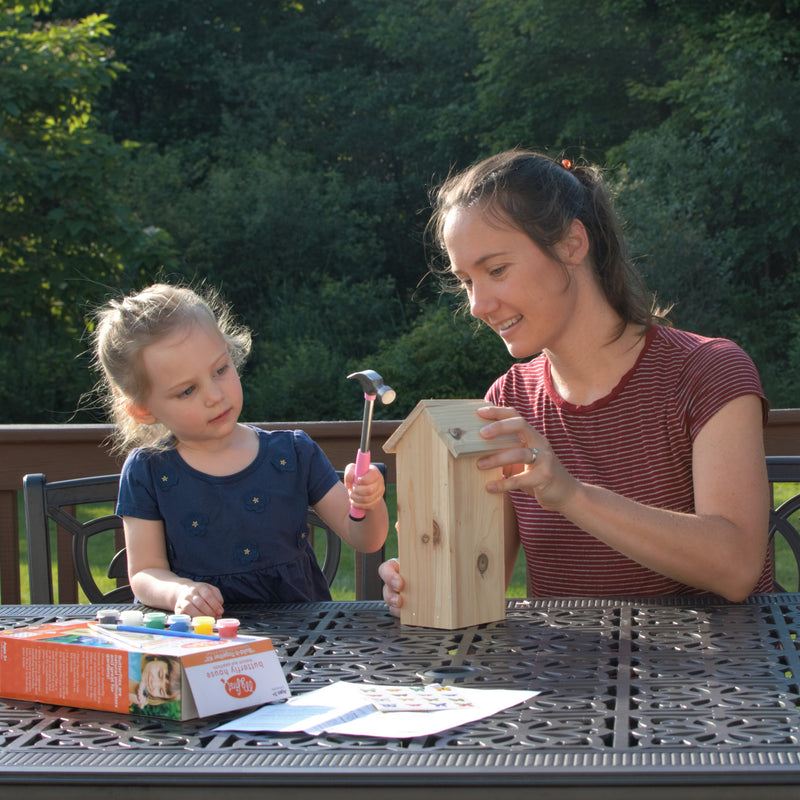 Load image into Gallery viewer, mother and child assembling My First Butterfly House
