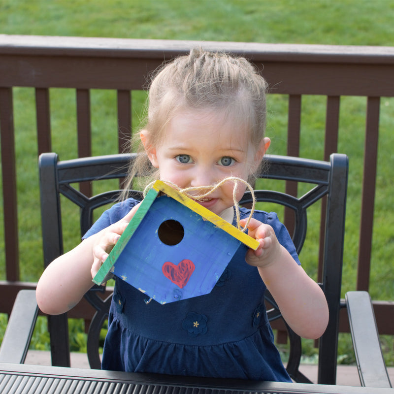 Load image into Gallery viewer, child holding finished my first wren house