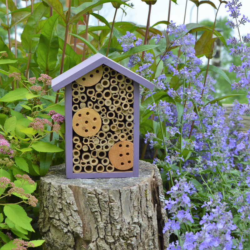 Load image into Gallery viewer, Better Gardens Bee House sitting on stump in garden
