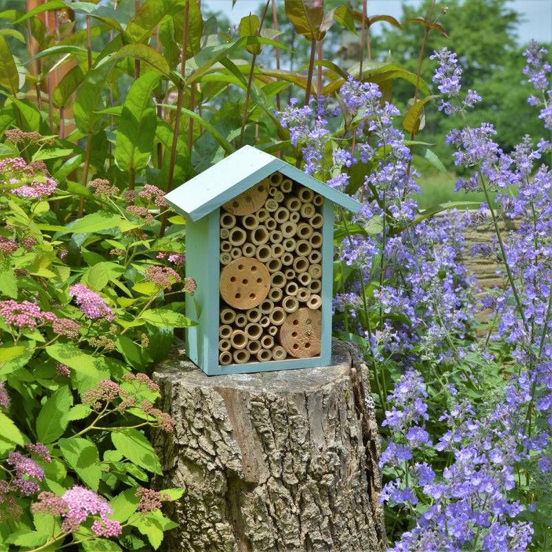 Load image into Gallery viewer, Better Gardens Bee House sitting on stump in garden
