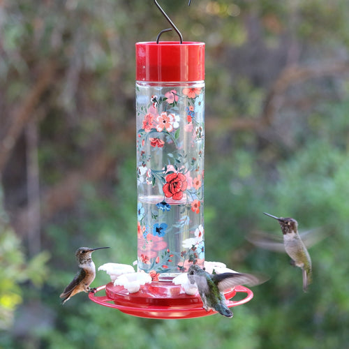 hummingbirds feeding from Vintage Blossom Decorative Glass Hummingbird Feeder