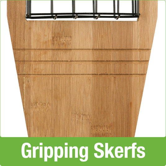 Close up of three gripping skerfs on Nature's Way Tail-prop Suet Bamboo bird Feeder