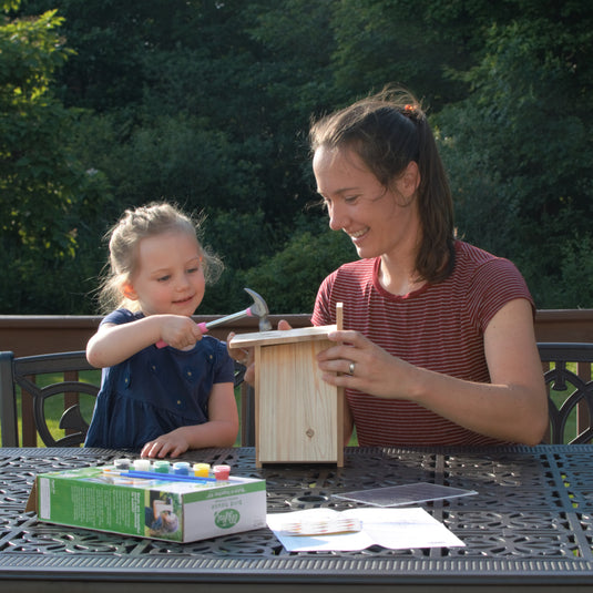 mother and child assembling My First Bird House w/ Viewing Window