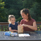 mother and child assembling my first wren house