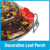 three decorative leaf perches on Nature's Way red, yellow and black speckled hand blown glass garden hummingbird feeder
