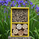 Better Gardens Deluxe Pollinator House with mud filled bamboo shoots and wood blocks