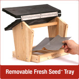 Demonstration of removable fresh seed tray on Nature's Way 6 QT Hopper cedar bird Feeder with two Suet Cages