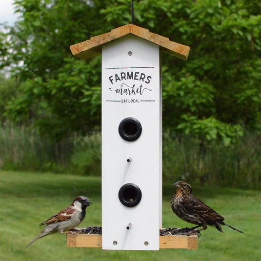 Multiple birds feeding from Nature's Way Wild Wings Farmhouse Vertical cedar bird Feeder