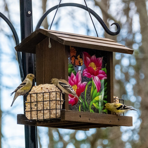 goldfinches feeding from nature's way stained glass hopper feeder