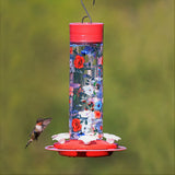 hummingbirds feeding from Vintage Blossom Decorative Glass Hummingbird Feeder