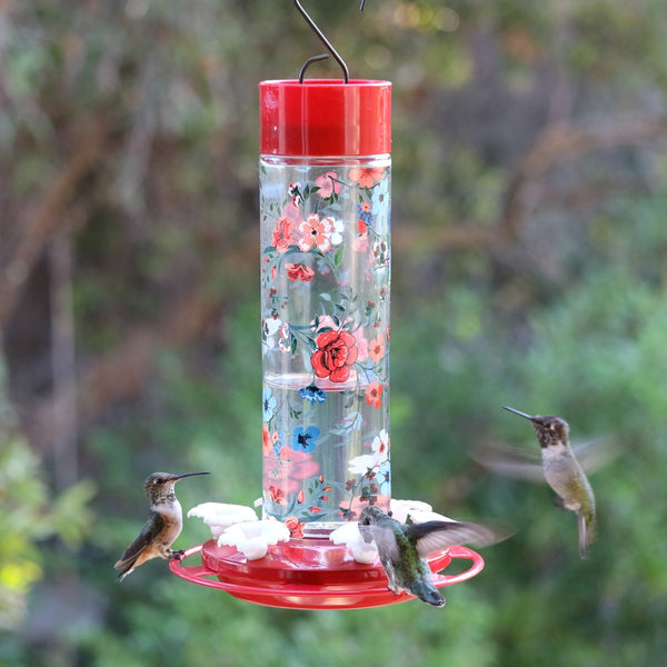 hummingbirds feeding from Vintage Blossom Decorative Glass Hummingbird Feeder