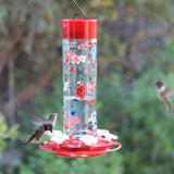 hummingbirds feeding from Vintage Blossom Decorative Glass Hummingbird Feeder