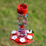 hummingbirds feeding from Vintage Blossom Decorative Glass Hummingbird Feeder