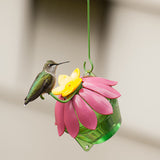 hummingbird perching on the Nature's Way So Real Single Flower Hummingbird Feeder - Pink